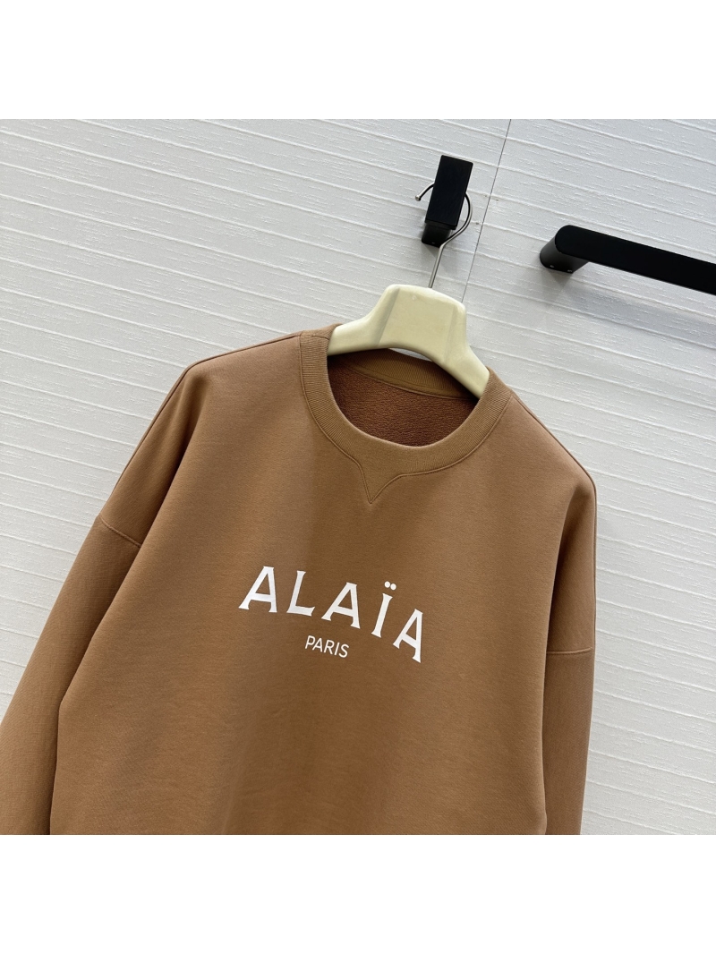 Alaïa Cotton Cropped Logo Sweatshirt in Camel | Signature Ribbed Cuffs & Drop Shoulder