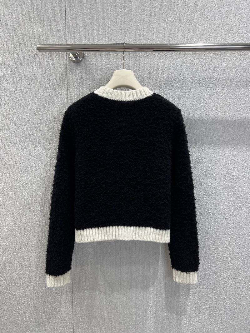 Chanel Boutique Black & Cream Cropped Knit Cardigan - Soft Bouclé Wool, Timeless Contrast Trim, Elevated Casual Luxury